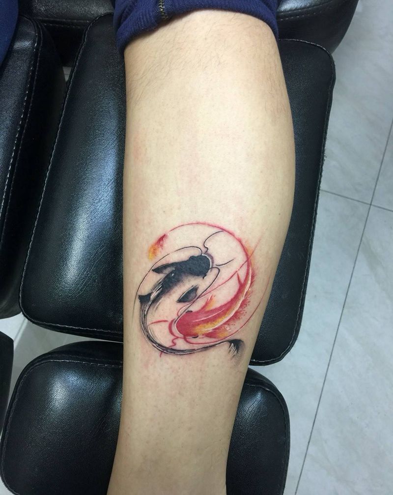 太极鱼纹身图片_成品腿部传统清新动物纹身图案