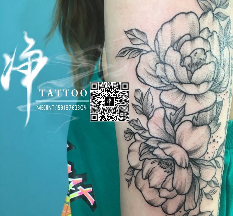 点线花纹身图片