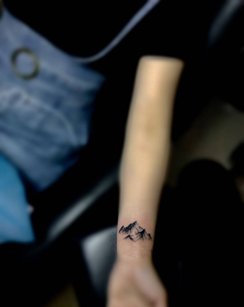 高山缺大海。纹身图片_手臂几何纹身图案