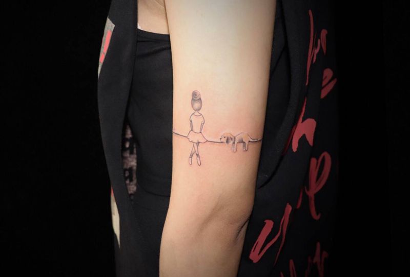 女人和狗…留在了顾客的心尖上纹身图片_手臂纹身图案