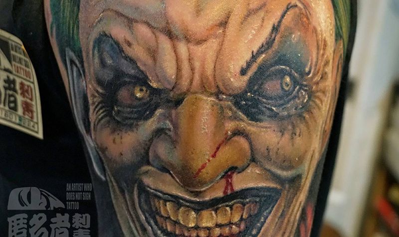 彩色写实  小丑混搭涂鸦风格纹身图片_肩部手臂欧美肖像写实人物鬼神原创成品纹身图案
