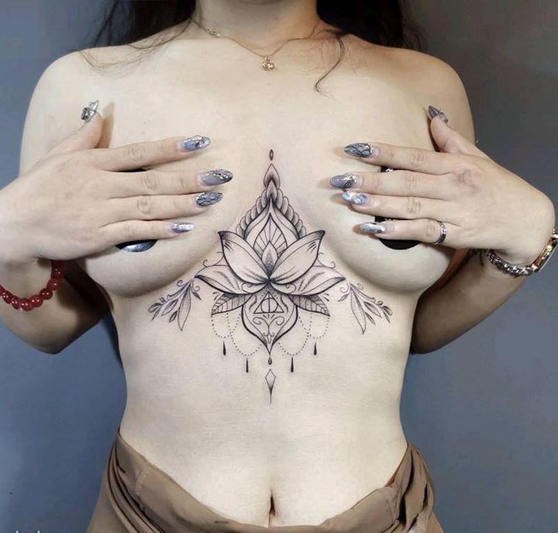 梵花纹身图片_胸部腹部几何点刺纹身图案