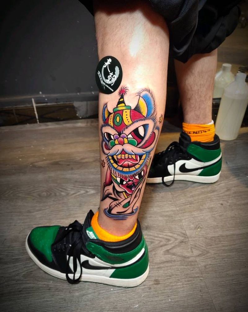 唐狮纹身图片_脚部纹身图案