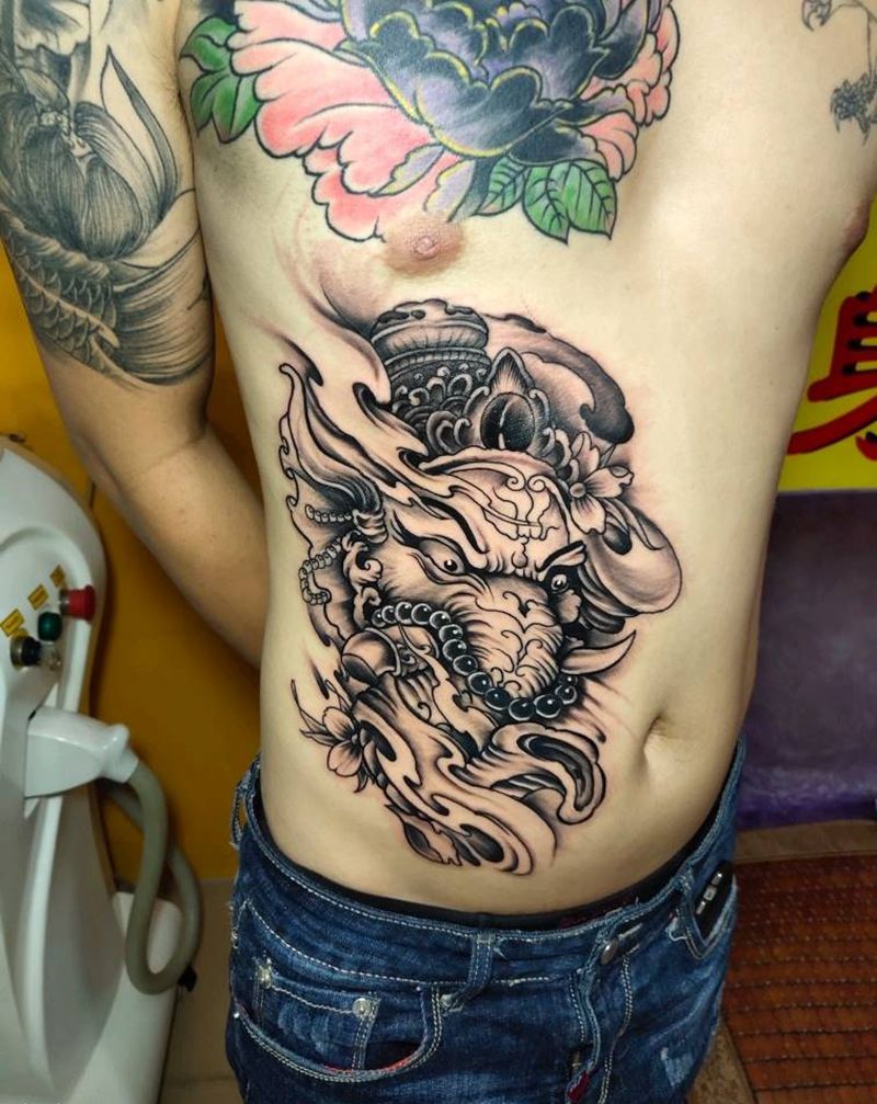 腹部象神纹身图片