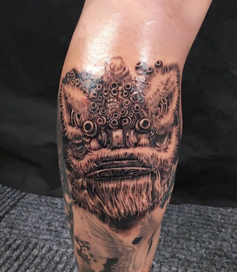 醒狮纹身图片_腿部欧美写实纹身图案