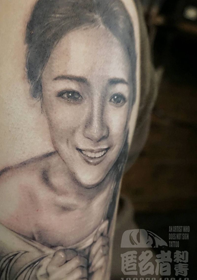 写实肖像纹身图片_肩部手臂肖像写实人物成品纹身图案