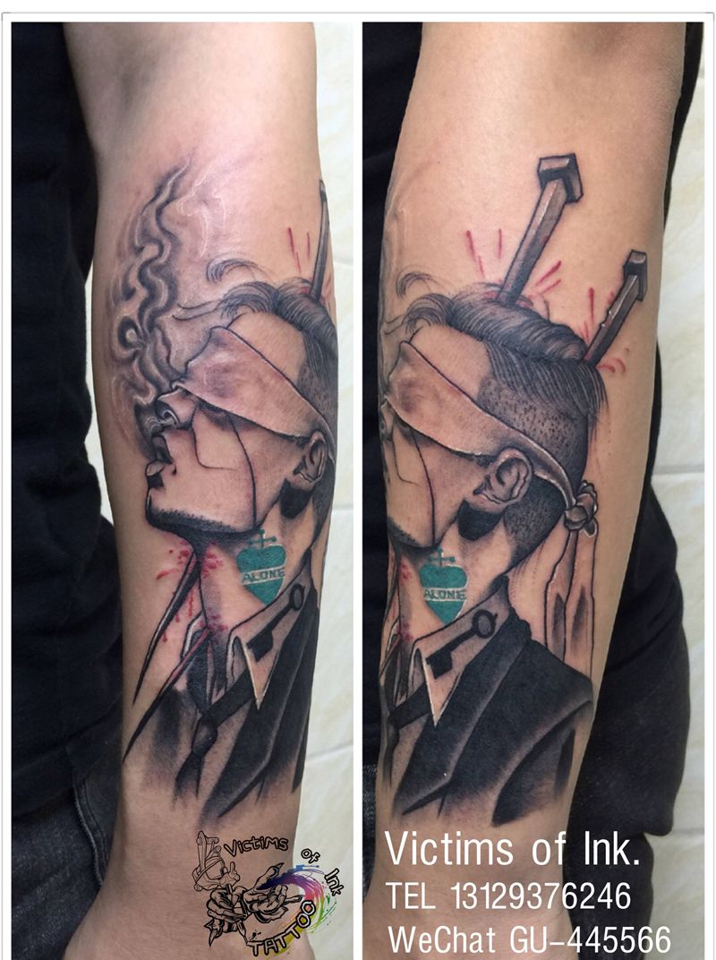 钉子蒙脸男纹身图片