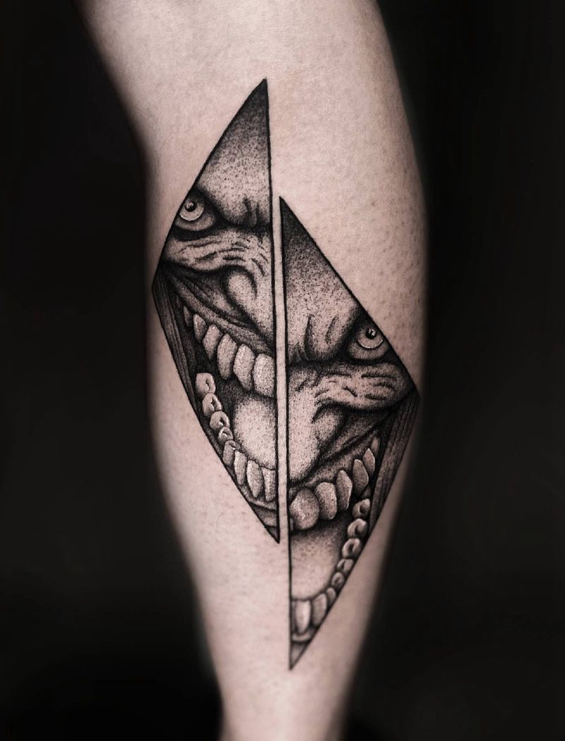 邪恶的Joker笑容纹身图片_腿部几何点刺Joker点刺暗黑纹身图案