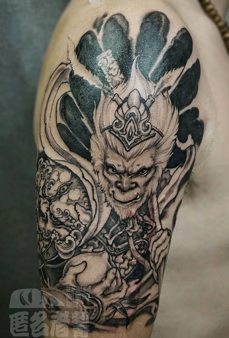 大圣  蟠桃纹身图片_手臂新传统大圣孙悟空大臂纹身图案