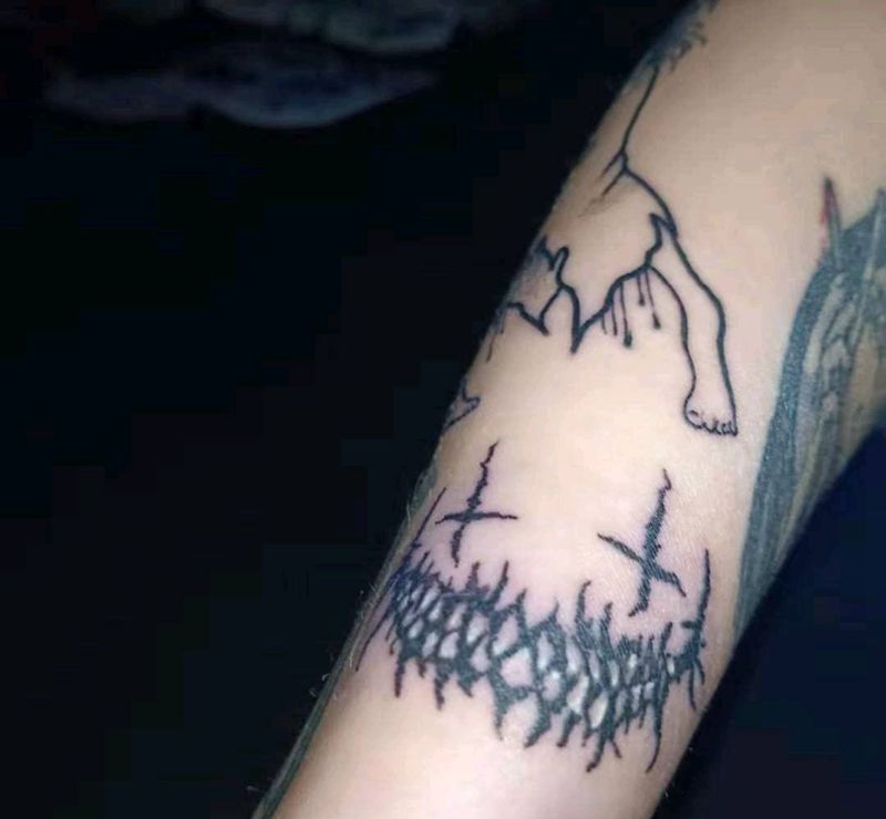 暗黑笑脸纹身图片_手部纹身图案