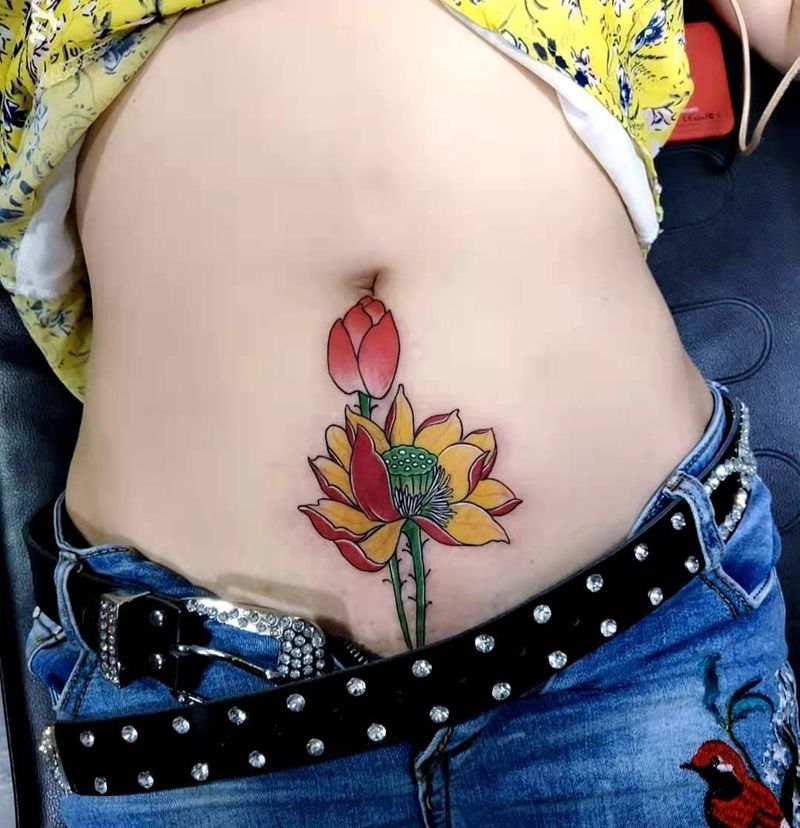 荷花遮盖纹身图片_腹部纹身图案