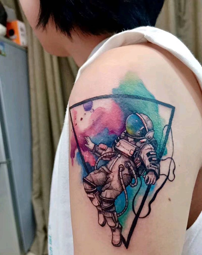 灿烂的宇航员纹身图片_水彩纹身图案
