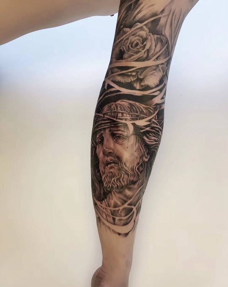 圣经花臂纹身图片_手臂欧美写实纹身图案