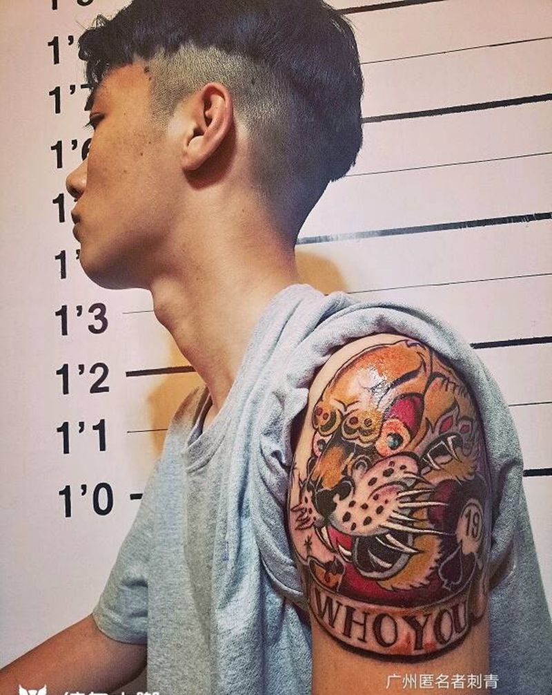 scoool纹身图片_手臂欧美动物广州成品纹身图案