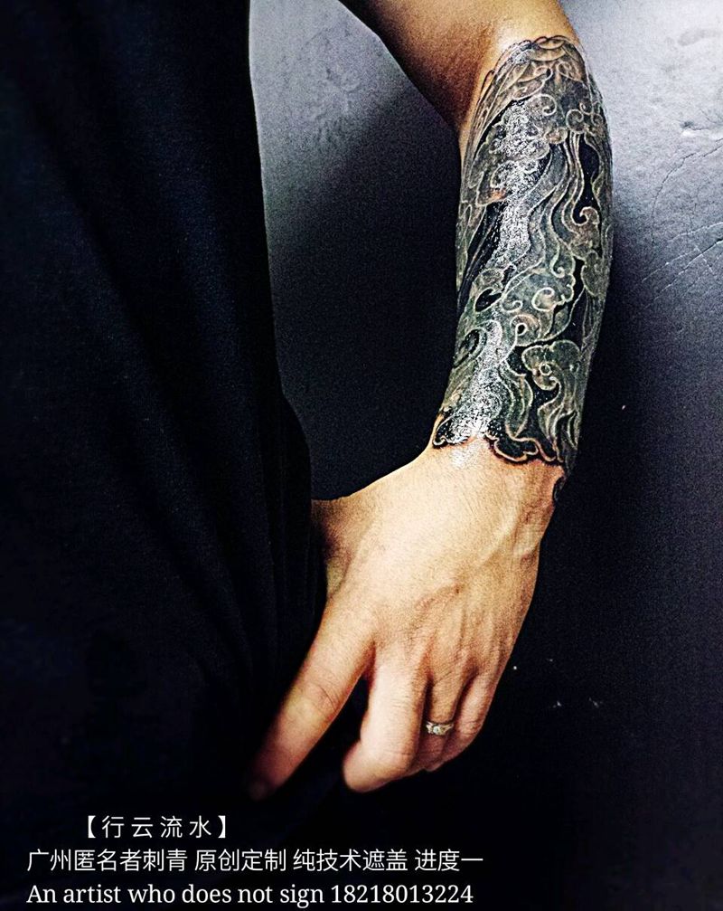 行云流水纹身图片_手臂传统原创广州遮盖成品纹身图案
