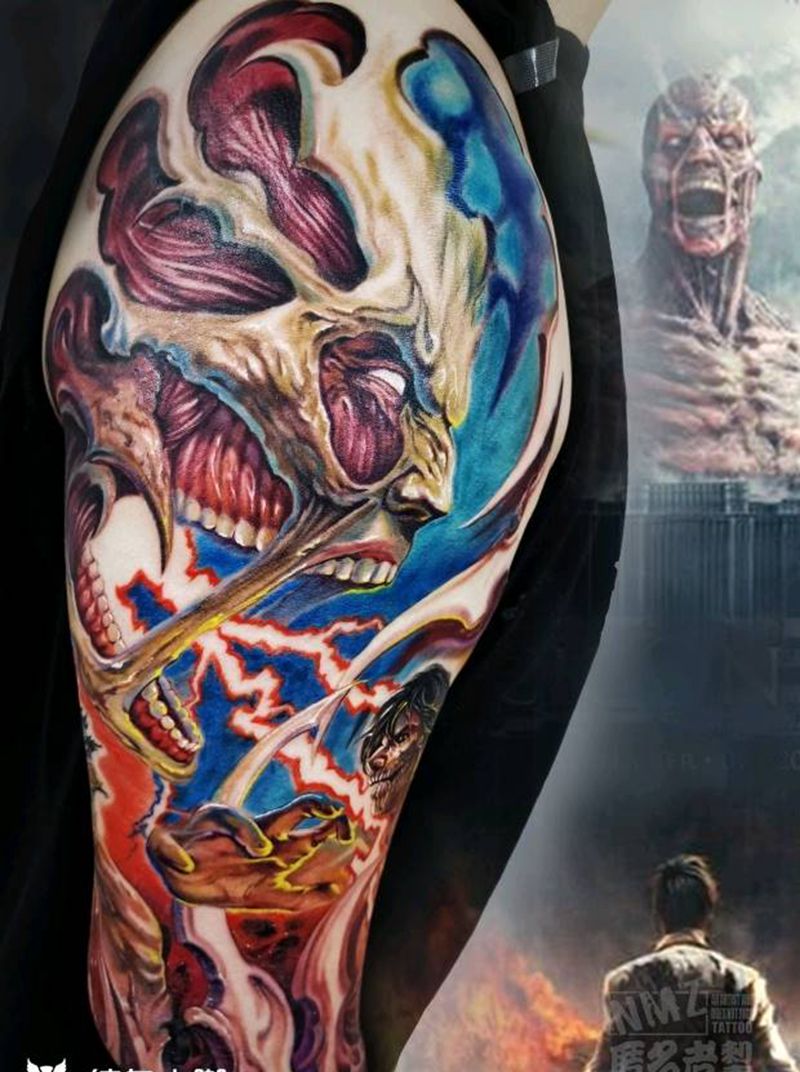 进击的巨人 局部纹身图片_手臂肩部欧美写实动漫进击的巨人花臂纹身图案