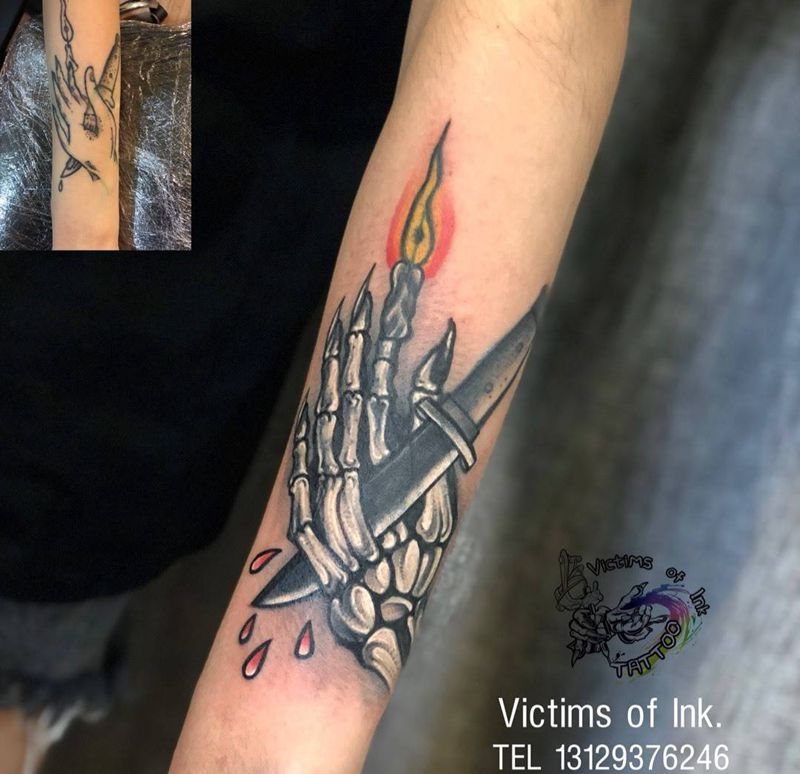 骷髅手纹身图片