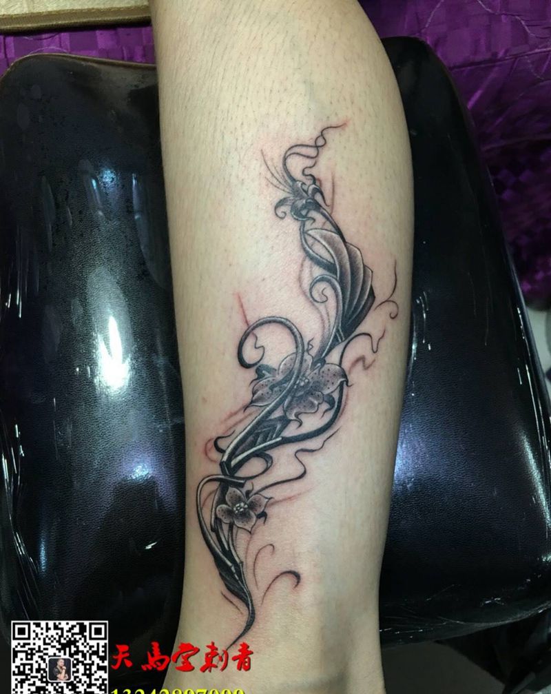小腿立体花腾纹身图片