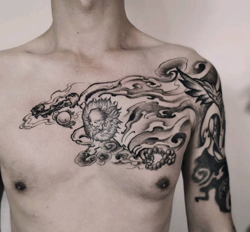 包胸  鹤  达摩纹身图片_胸部手臂新传统鹤达摩纹身图案