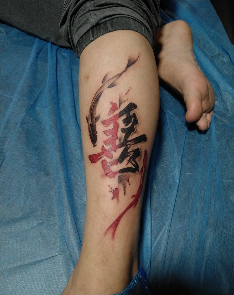 双鱼纹身图片_腿部新传统纹身图案