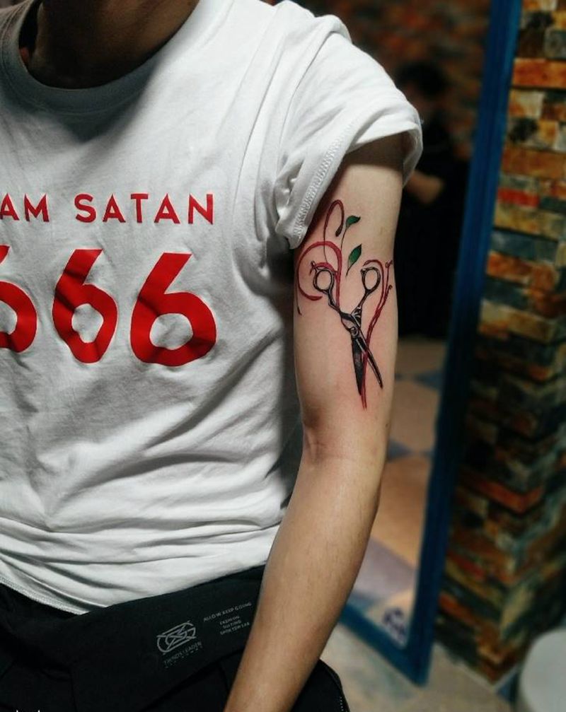 剪纹身图片_手臂纹身图案