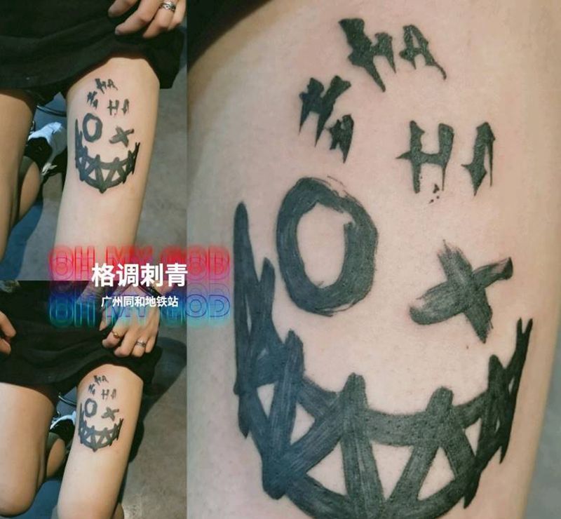 笑脸纹身图片_腿部笑脸纹身图案