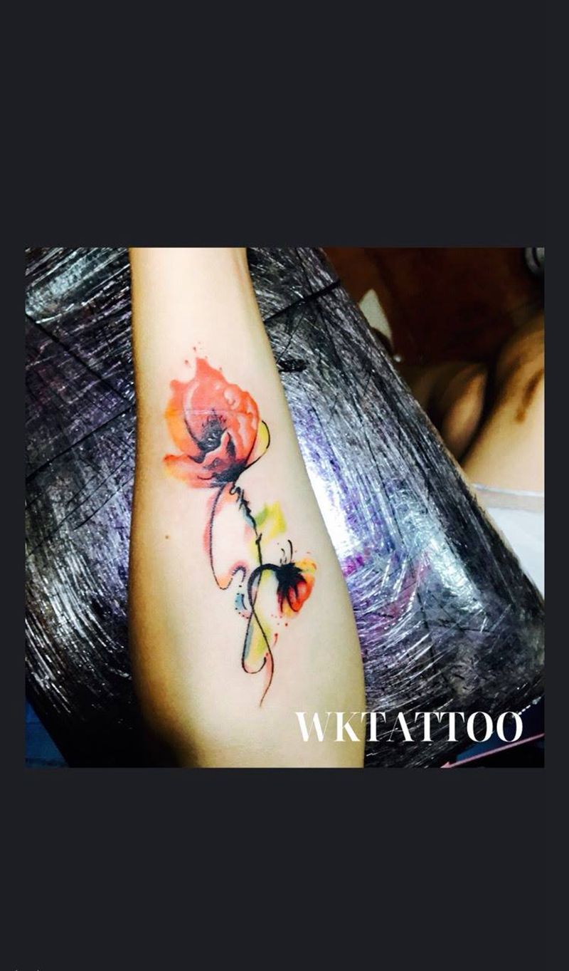 罂粟花纹身图片_成品手臂清新植物纹身图案