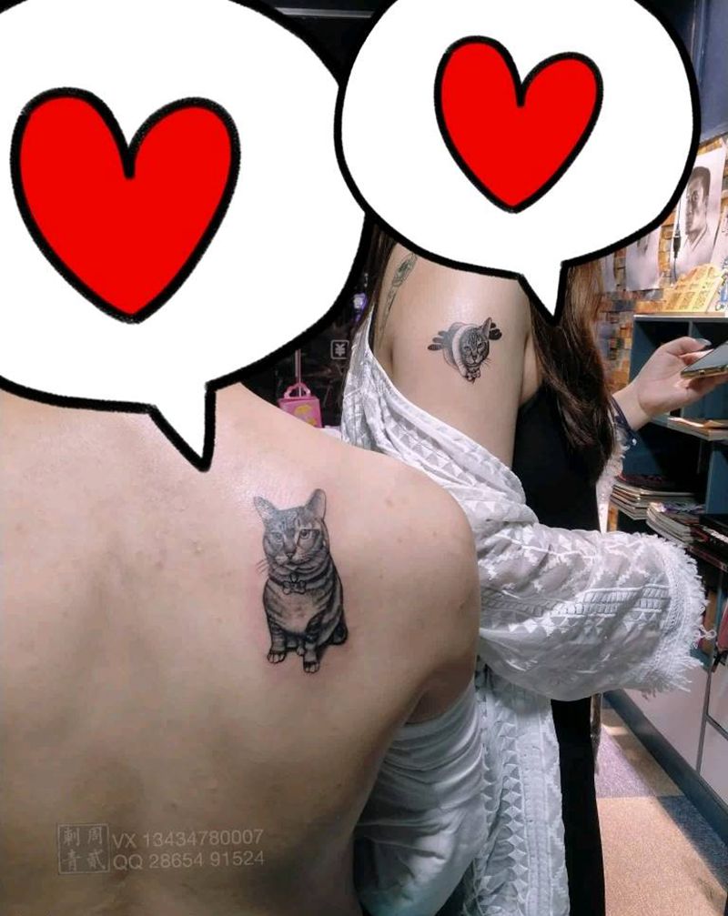 她的猫纹身图片_手臂猫纹身图案