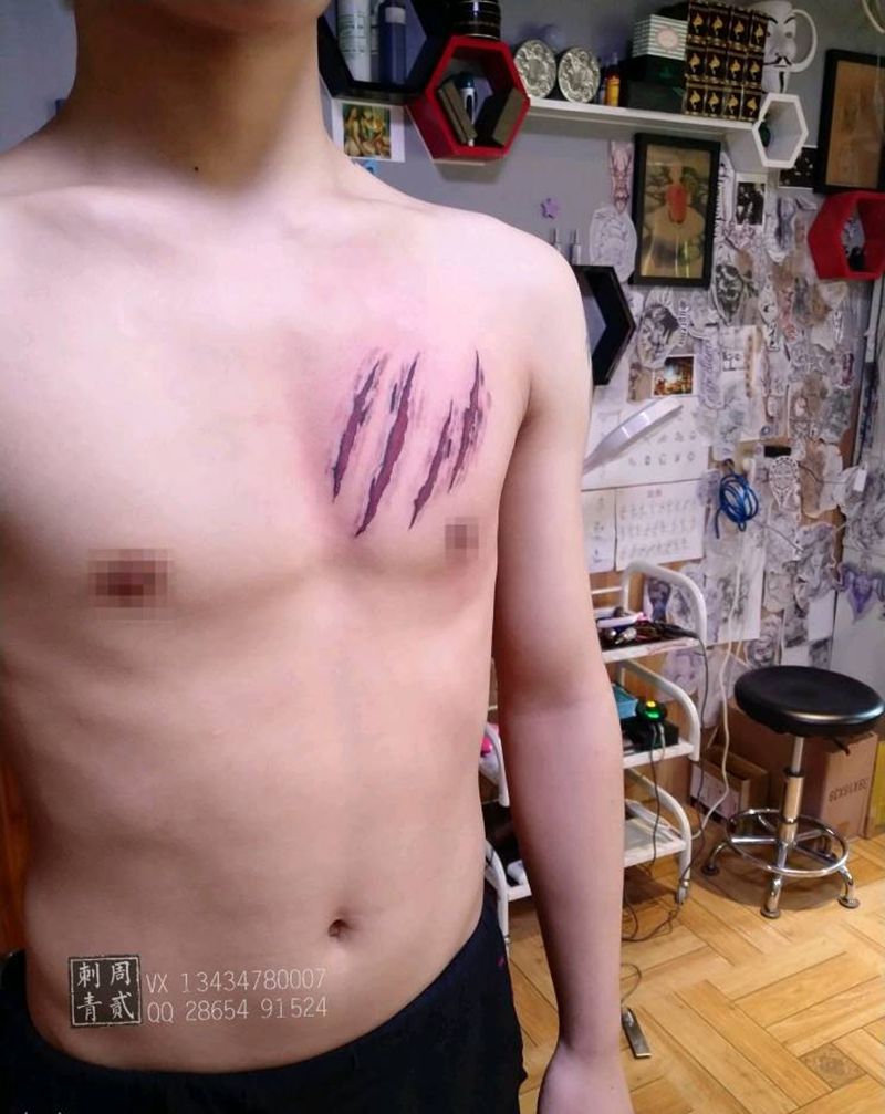 伤纹身图片