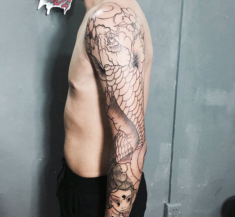 花臂遮盖未完成纹身图片_成品原创植物动物传统手臂纹身图案