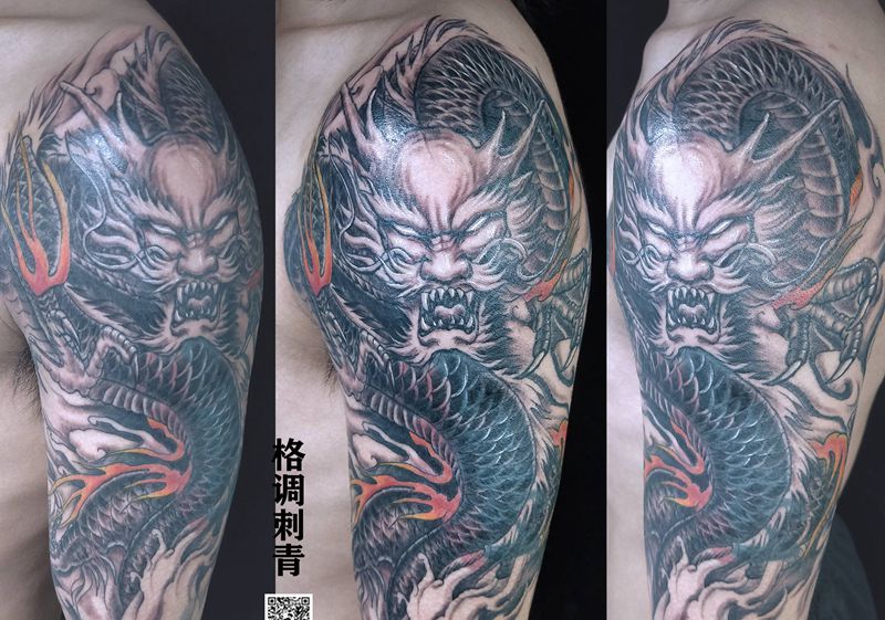 大臂龙遮盖纹身图片_手臂新传统遮盖龙纹身图案