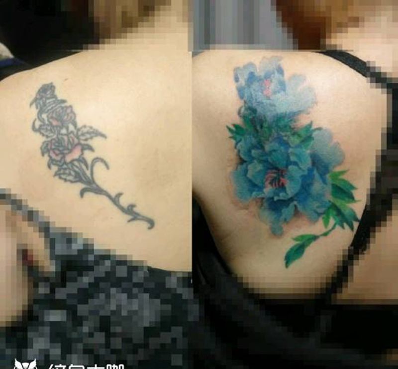 旧花遮盖纹身图片_肩部纹身图案