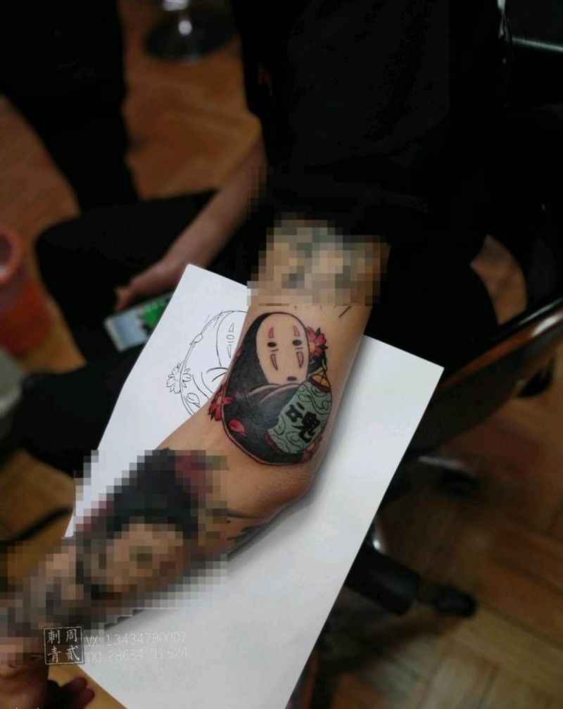 无脸男纹身图片_手臂纹身图案