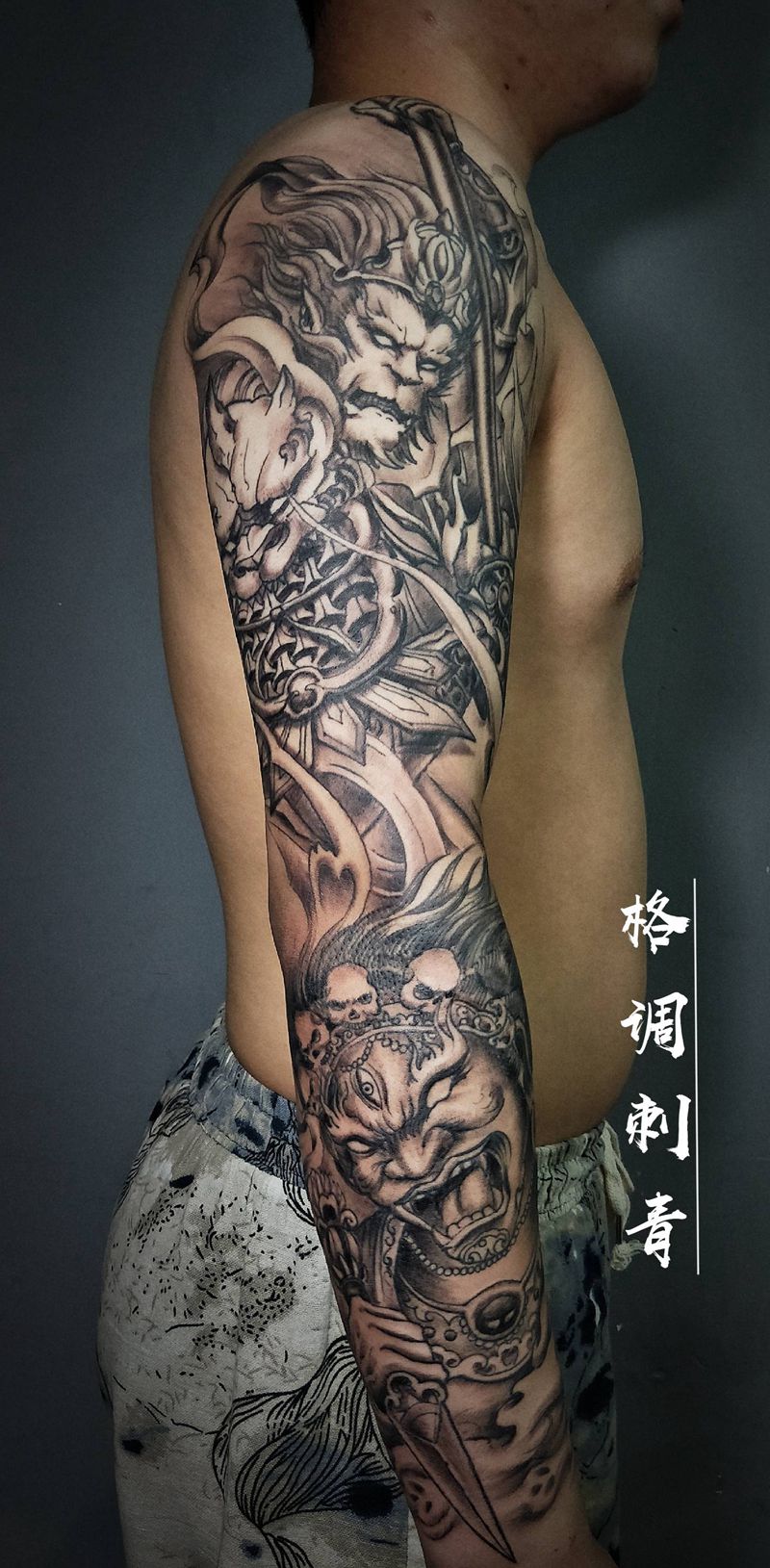 神话主题花臂纹身图片_手臂新传统悟空大黑天猴子纹身图案