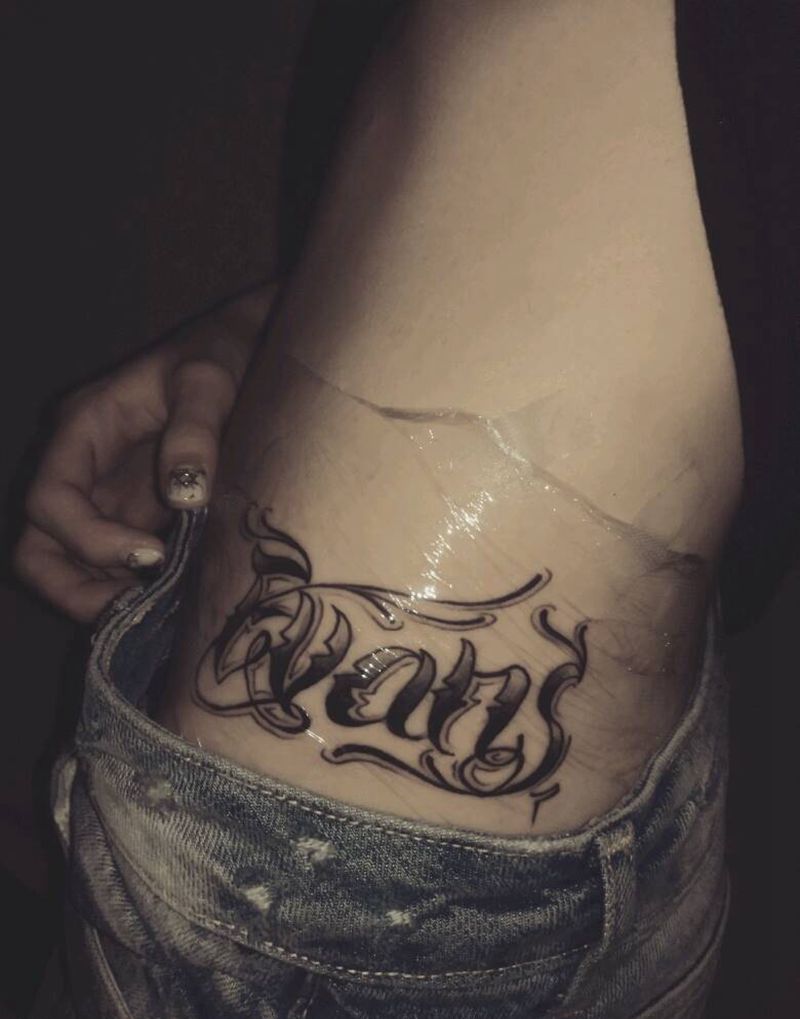 Evans纹身图片_腰部欧美字符原创唐日英LIFE成品手稿纹身图案