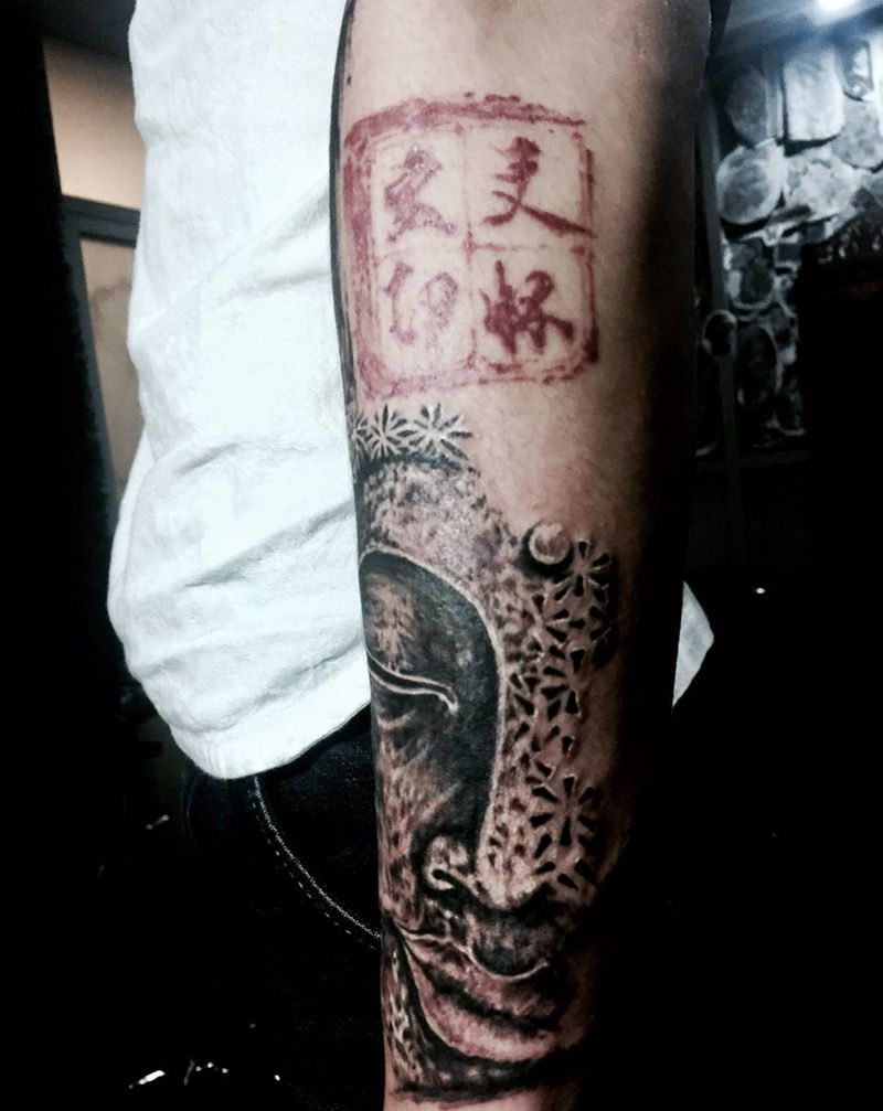 半面佛纹身图片