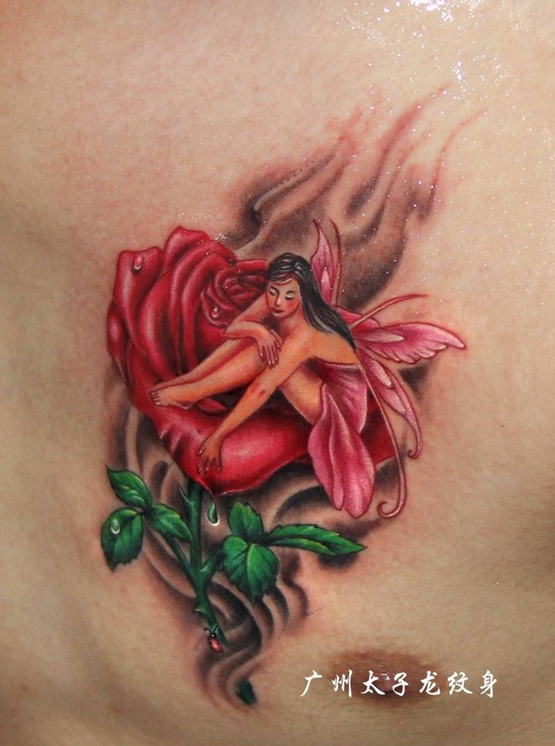 玫瑰花天使纹身纹身图片_胸部成品欧美传统习俗肖像原创纹身图案
