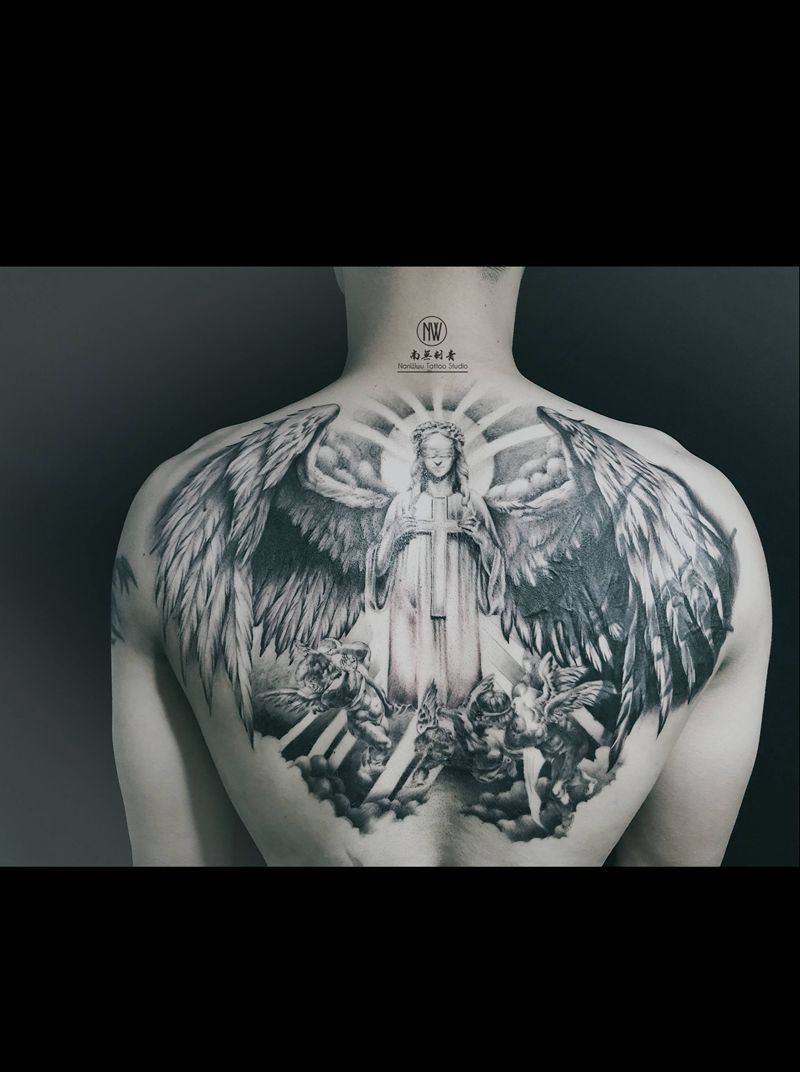 蒙眼的圣母纹身图片_背部欧美写实纹身图案