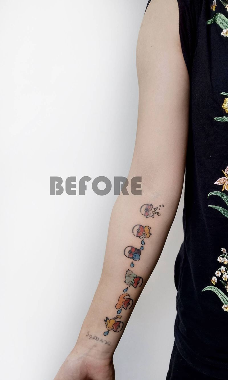 鱼纹身图片_手臂水墨纹身图案