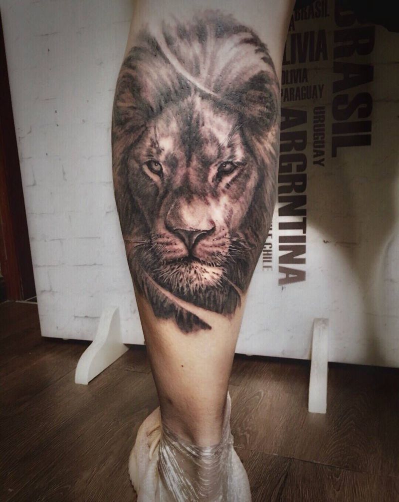 狮子纹身图片_腿部欧美写实纹身图案