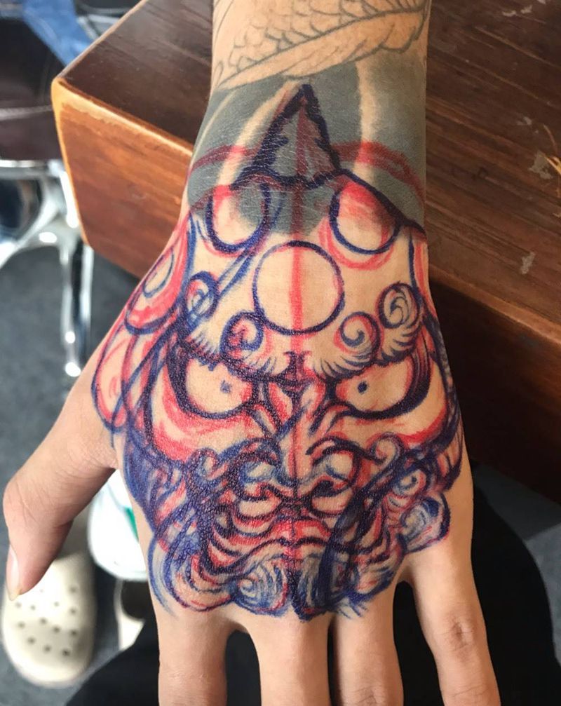 唐狮子纹身图片_手部老传统纹身图案