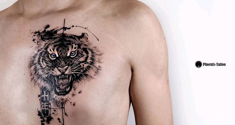 大挠斧纹身图片_胸部欧美写实纹身图案