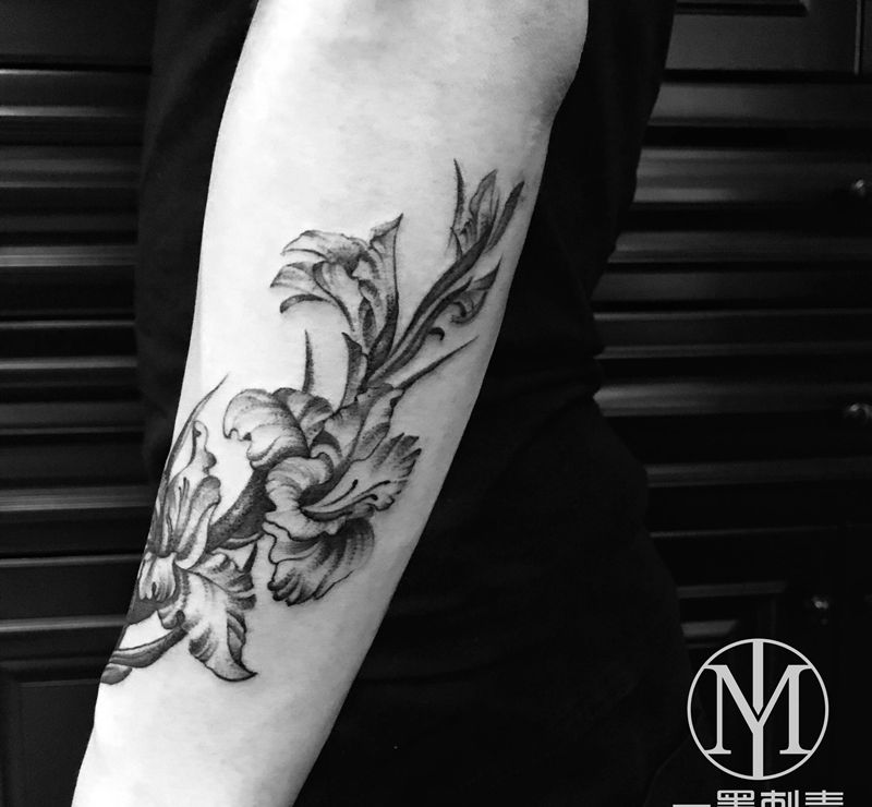 兰花。纹身图片_手臂点刺纹身图案