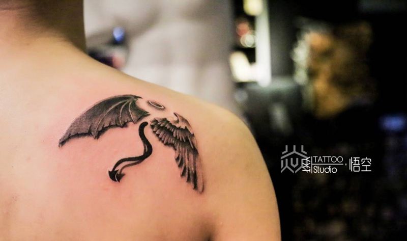 一半天使，一半恶魔纹身图片