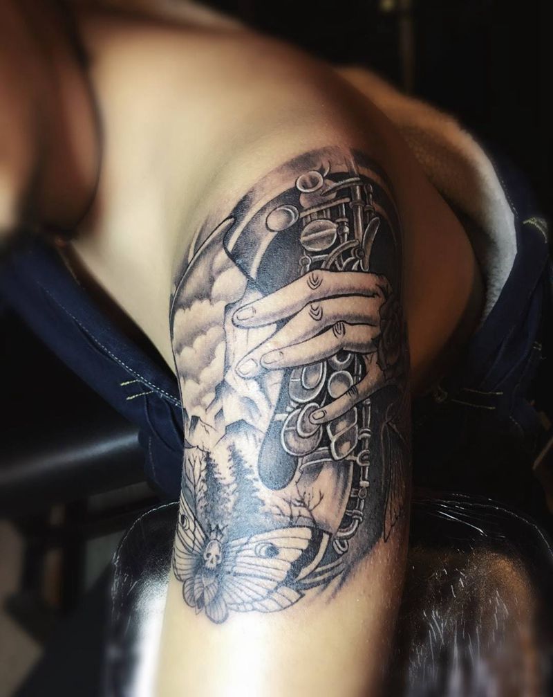 萨克斯风纹身图片_成品手臂清新写实欧美字符几何人物纹身图案