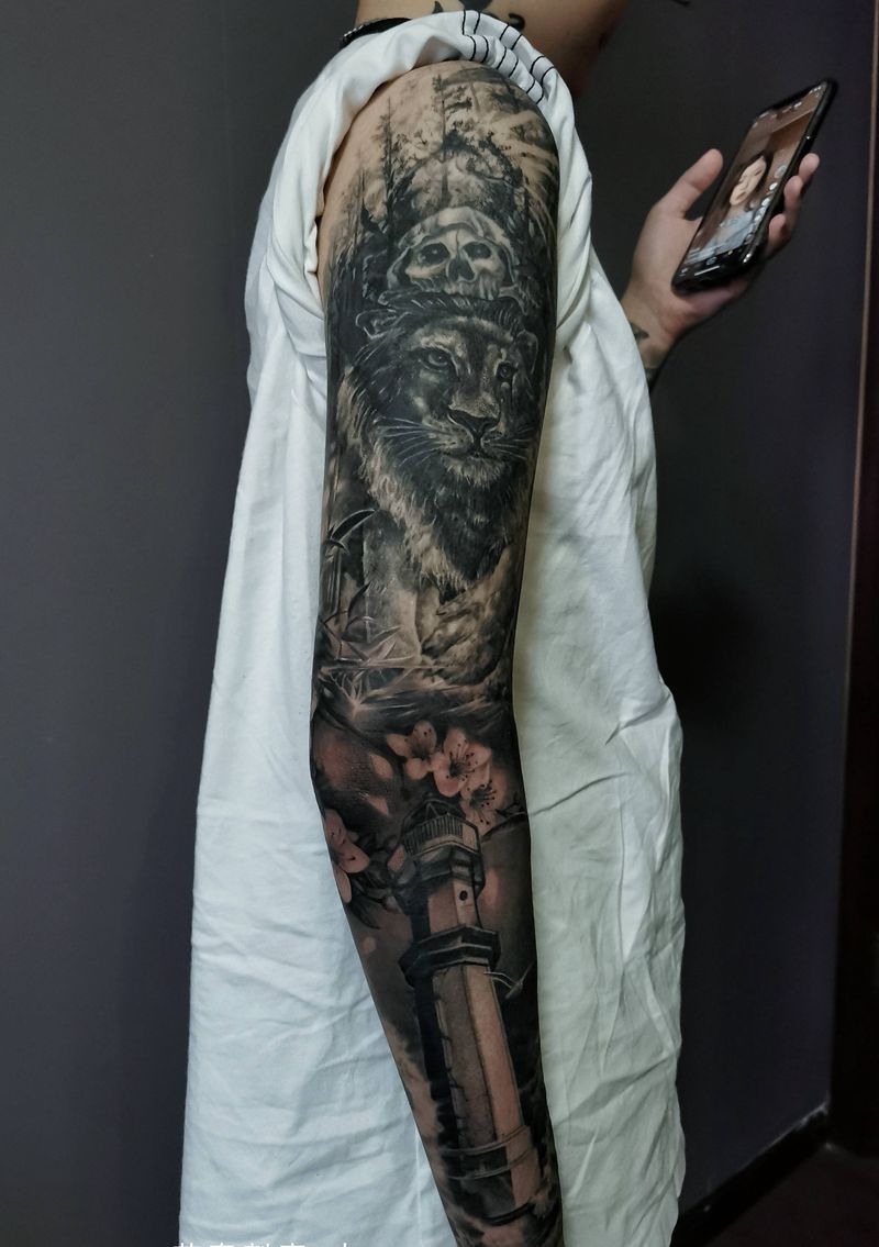 狮子灯塔纹身图片_欧美写实纹身图案