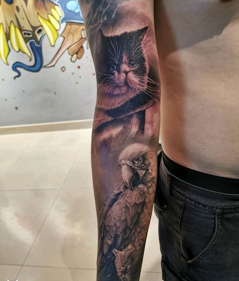 猫和鹦鹉纹身图片_手臂欧美写实纹身图案