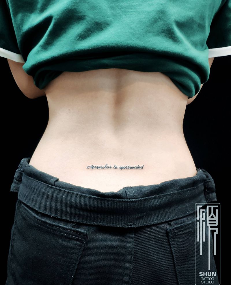 西班牙小文字纹身图片_腰部纹身图案