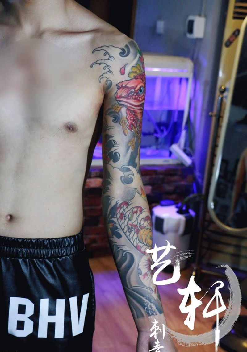 传统花臂纹身图片_传统手臂纹身图案