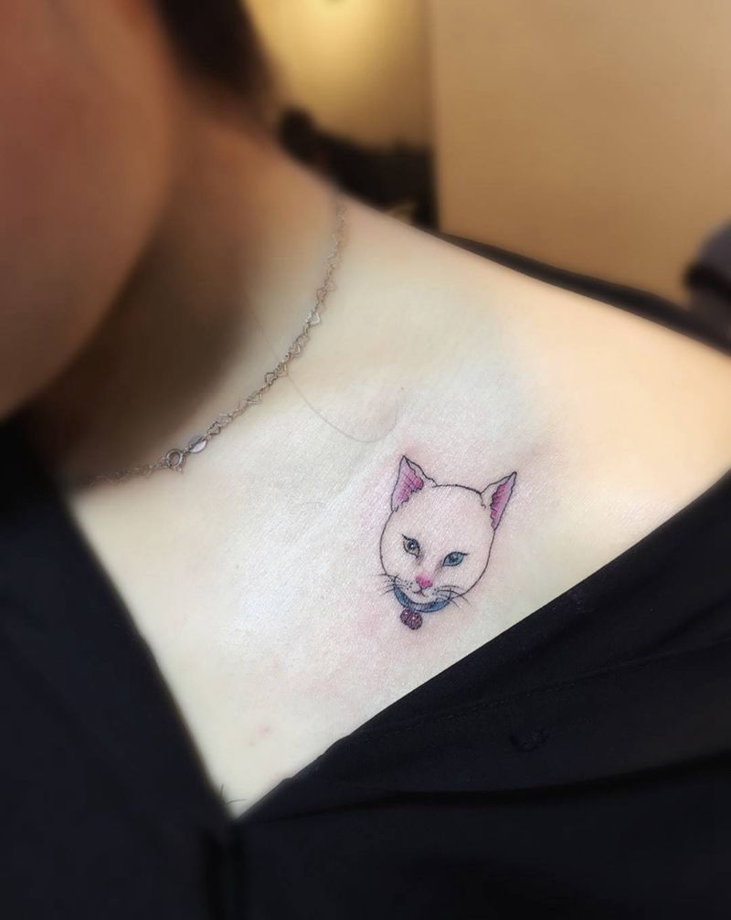 咪咪纹身图片_胸部成品清新动物纹身图案